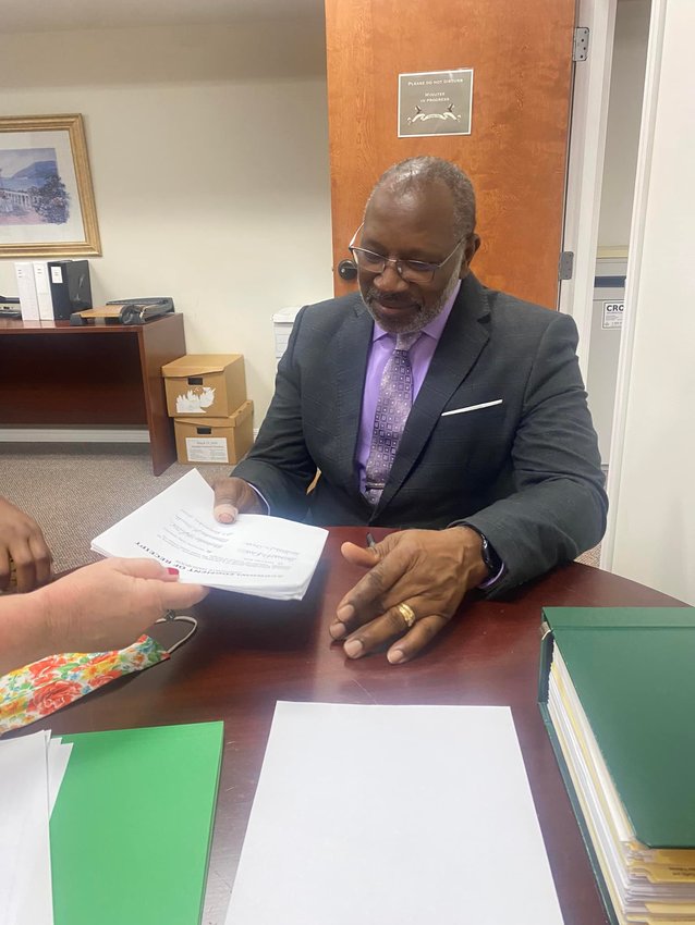Commissioner Alexander Smith (Seat #1) completes his qualifying documents to run for re-election to the city commission.