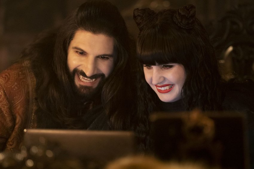 Kayvan Novak, left, and Natasia Demetriou star in FX’s “What We Do in the Shadows,” with Season 4 coming to Hulu on July 13.